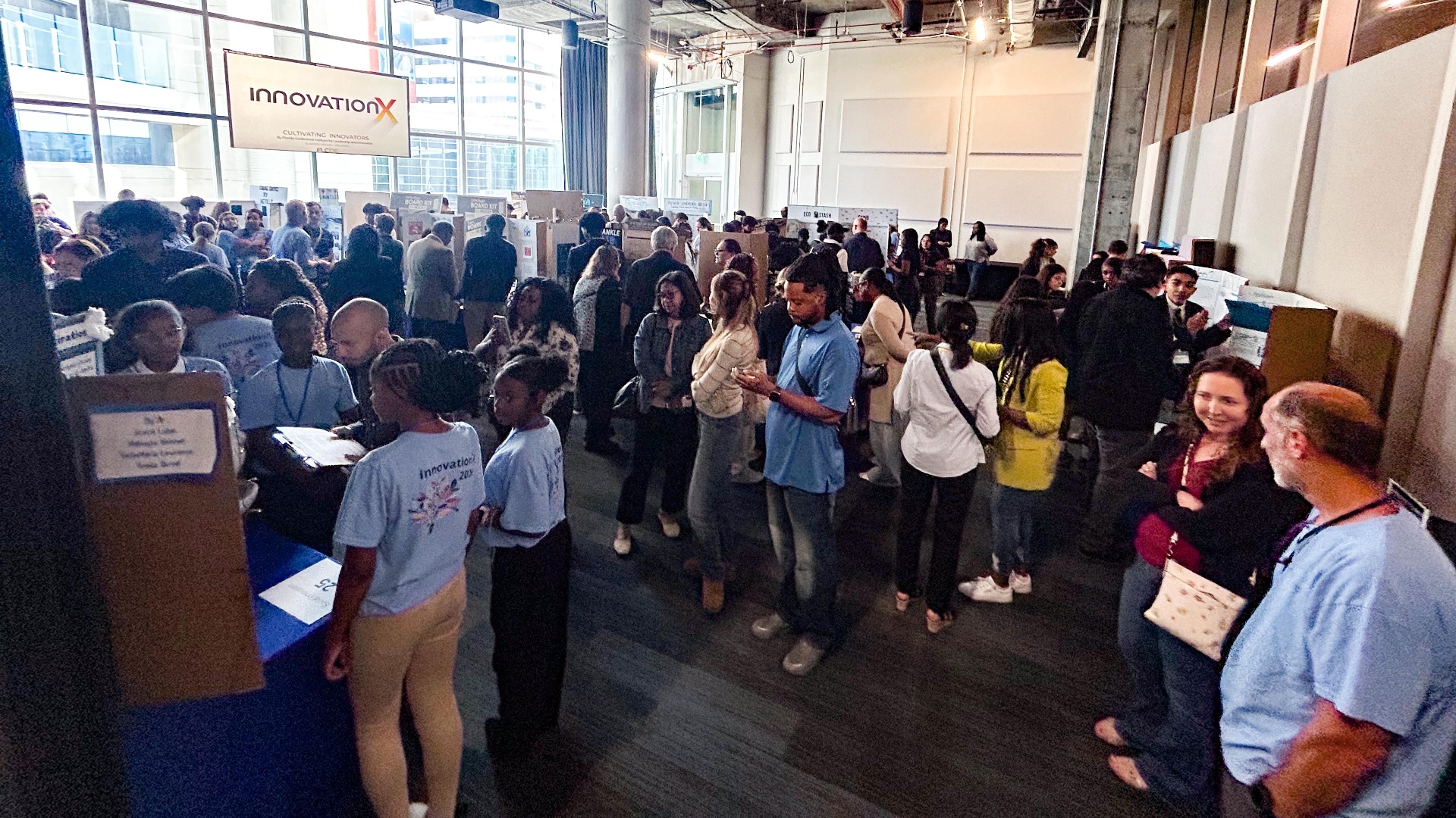 Students presenting projects at an innovation showcase